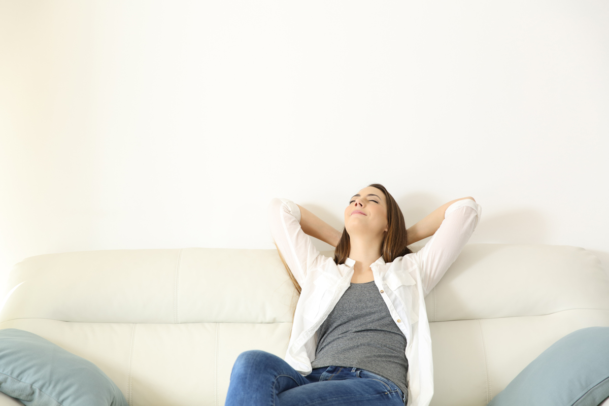 Woman relaxing in air conditioning